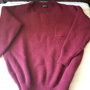 Super soft wine colored sweater.